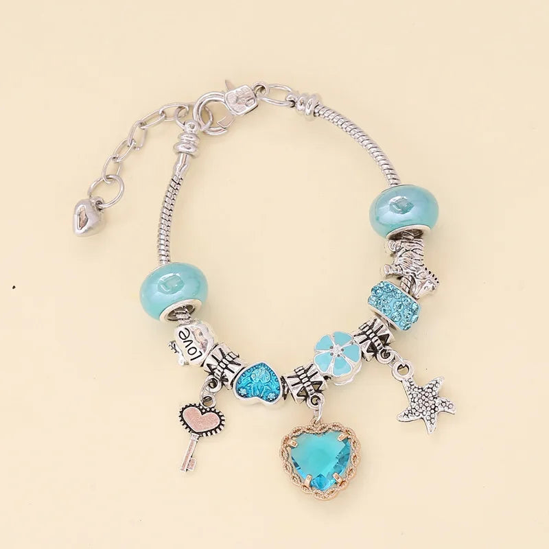 Trendy Colorful Pandora Lucky Rainbow Charm Bracelet | Four-Leaf Clover, Starfish & Heart Pendants