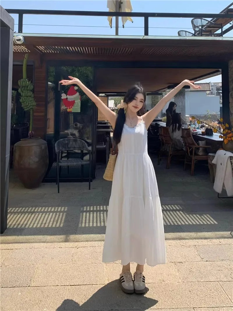 Summer 2025 Women’s Pure Cotton White Strap Dress with Long Sleeve Ice Silk Knitted Sun Protection Cardigan Set – Elegant Fashion